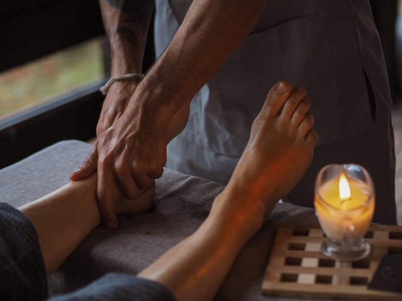 person receiving a foot massage